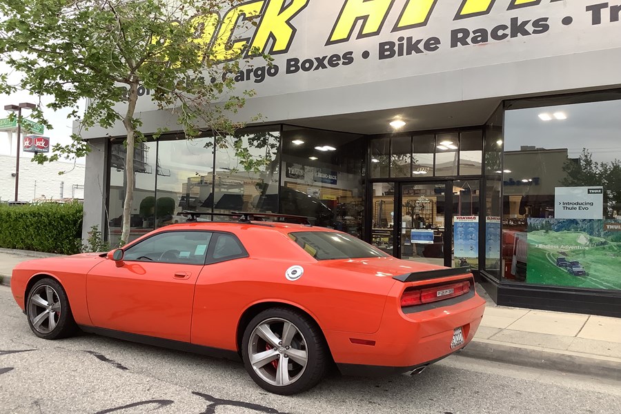 Custom tracks with Yakima Skyline towers and 50 in. Black Jetstreams on this sweeeet 2010 Dodge Challenger SRT with a 6.1 HEMI engine!! 
