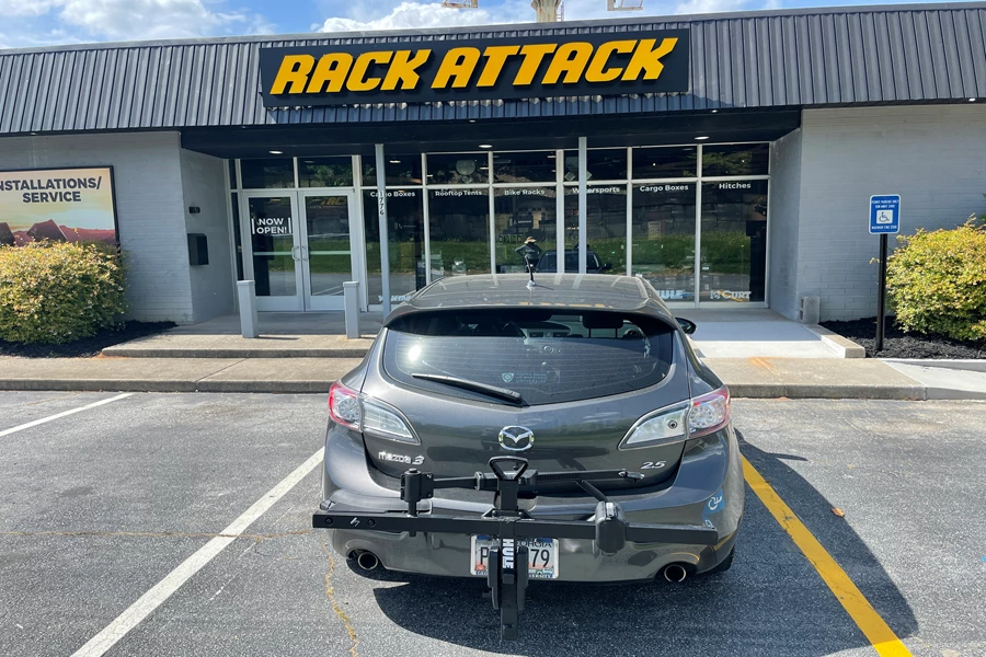 2012 Mazda 3 4dr with a thule T1 bike rack.