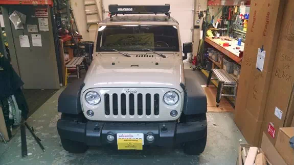 Custom track and fixed point setup for carrying up to 130lbs on a Jeep Wrangler JK 2dr